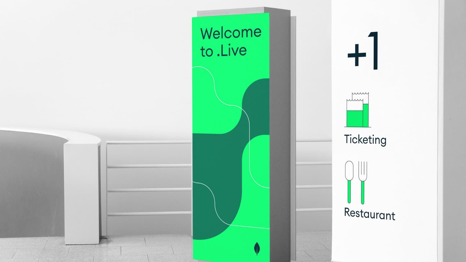 MongoDB .live wayfinding signage in green